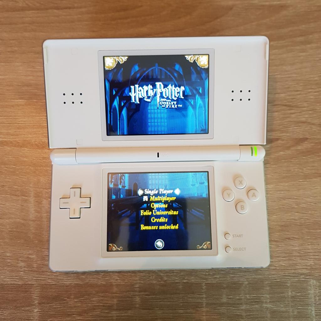 DS Lite in white very good condition. Comes with plastic hard case, Bag, Charger and 3 games Harry Potter, Ice Age 2 and Brain Training. Collection only, or can deliver locally.