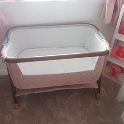 selling a pink tutti bambini luxe next to me crib like new condition