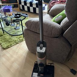 This is hydrogen that vacuums and cleans hardwood floors. Completely cordless and light and it mops whilst it cleans. Comes with cleaning solution and can be used as a vacuum. It has a self clean mode and I have a receipt with a full 12 month warranty and when registered, Shark give you a 3 year warranty also. This is £249 new which was a reduced price from £299.