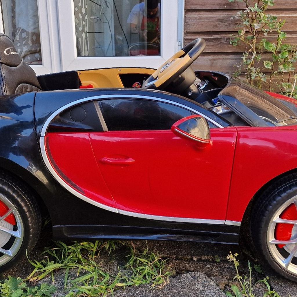 This is electric bugatti car for kids. It can be used for 2 to 5 years old kids. It comes with seat belt for kids safety. It also has remote control for parents to control the car from remote. Car has few built in music tracks you can play. You can also connect aux, Bluetooth and a USB to play your songs. Car also had lights. So, it can be driven at night. Well kept and a clean car. Great fun for kids.