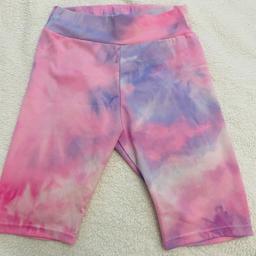 Pink purple tie dye cycling shorts
Brand label has been removed but i think these were bought from urban outfitters. 
Looks lovely on. 
Label states s/m iam a uk 8/10 and they fit me fine. 
Measurements: 13” length 19.5” approx 
COLLECTION SHILDON OR CAN POSTAGE FOR £3 BT!