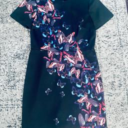 Stunning warehouse spotlight butterfly dress.
This is perfect for a special occasion i teamed it with red heels and lipstick and you’re good to go.

Dimensions: chest 17.25” x waist 15” x length 34.25” approx.

COLLECTION SHILDON OR CAN POST FOR £3 BT!
