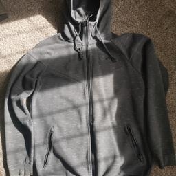 Nike Tech Fleece hoodie size L, in grey. VGC. Smoke and pet free home. Cash on collection only please.