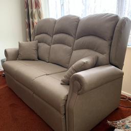 Beverley standard dual motor smart riser recliner chair and three seater sofa in ‘Infinity mousse’ which is a very nice grey/beige. It has been sat on literally a dozen times. Aside from a little pen mark on both the sofa arm and chair it is like new. 
Cost new £2400
