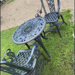 Antique bronze looking plastic table and 2 armchairs, really serviceable because no rust just wash over, stunning looking with lots of detail can possibly deliver