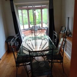 Dining room table and chairs glass top good quality chairs.