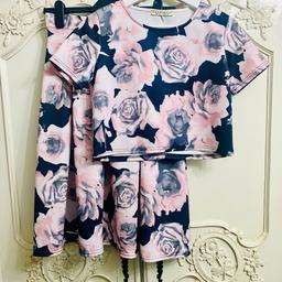 COLLECTION SHILDON OR CAN POST FOR £3 BT! 
Stunning two piece new look rose print top and skirt.
Worn once for a special occasion.
Label states innocence which was a label bought from new look.
Dimensions top UK 12 w 17.5” x l 16” top is a crop style
Skirt uk 10 w 13.5” x l 25.5” approx i wore the skirt high up on the waist so it looked very lady like.
Top is pull over and skirt has a side zip.