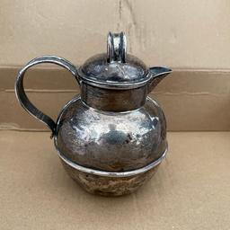 Sterling silver solid 130g teapot scraps at £75
Has got dents in it  all around 