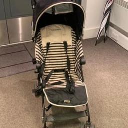 Maclaren Quest, Techno XT baby stroller, in black and cream stripes.  This includes a baby footmuff in black.