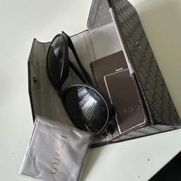mint condition like new hardley worn no scratches - mens designer sunglasses 

with box and cloth never used cloth 

only £60
