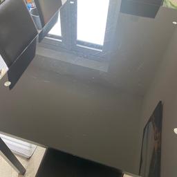 Black glass table & 4 chairs - some of the chairs fabric is marked (hence cheap price) new £145