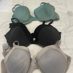 3 34c bras. All underwired. 
Black/white spotty bra in a excellent condition 
Green and grey bras in a good condition
