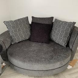 Excellent condition 4 seater grey and black sofa, cuddler chair and footstool for sale always been protected with throws cushion covers are all machine washable and the arms detached from the sofa for easy removal