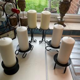 Wrought iron and cast iron candle sticks, holders and large candles 
New and unused 
Viewing welcome