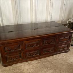 Lovely, solid wood coffee/tv table with storage and drawers. As you can see, it has some signs of use, but still a very attractive piece.