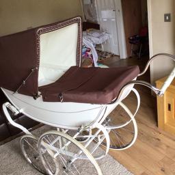 Osnath pram beautiful condition baby ready very bouncy brown hood and apron with white body 40” long all chrome is excellent condition ideal for pram collector or showing reborns in it has 24” wheels and 18” you will not be disappointed thanks for looking can arrange your own courier