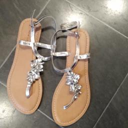 New silver  sandals