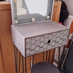 Here we have a small dressing table which I have adapted.  large hairpins legs attached and has a large drawer for makeup storage.   Comes with a mirror which is a mirror that I have added embellishments to and put in a box frame.  comes with a stool which has a cover on.  

Smoke and pet free home.