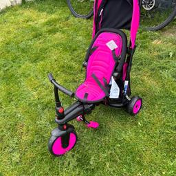 girls pink trike brought first birthday present. its been used twice and sat in cupboard ever since. so near enough brand new. has safey strap around the waist and a little sun canopy. collection prefect for summer days. from b33. I don't drive so cannot deliver.