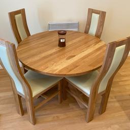 Solid Oak dining table and 4 chairs.

Fair condition with some water marks to tabletop.

Collection from Solihull town centre - B91.