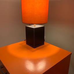 Dark brown leather finish lamp with an orange shade, makes for a unique looking item. Lamp in excellent condition.
£5 collection only from Saltdean.