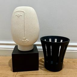 Included in the bundle are two H&M Home items, that are both in like new condition as they have only been used for the decoration the last couple of months. Included is a ceramic face ornament, which stands at 32cm tall and features a black wooded style square base and a beige stone effect upper head sculpture. Also included is a black metal tea light holder that stands at 23cm tall. From a pet and smoke free home / postage available.