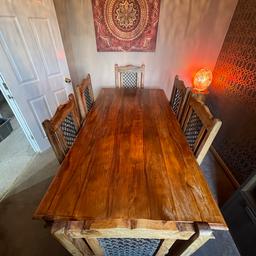 Authentic Sheesham / Jali style solid wood table and 6 chairs

Metal link pattern inlay to each chair and matching to edges of table

Includes premium cushions 

Very heavy and solid built

Length 1700mm
Height 760mm
Width 900mm