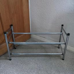 Extending shoe rack. L60-75cm. D23cm. Has rust marks and scratches. Collect in Wolverhampton, WV3 area.