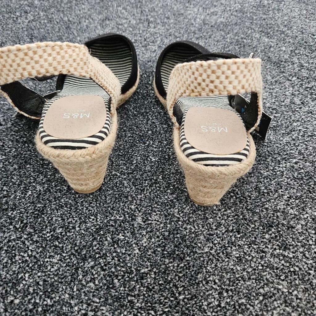 M&S size 5 (wide fit) sandal. closed toe. wedge heels.
buyer collects or could deliver if local. never worn still has labels attached.