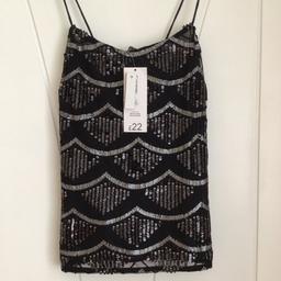 Beautiful ladies black & silver sequinned top with crossover back, size 8 New RRP £22.00