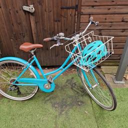 vintage aqua blue bike for women with a basket on front includes matching helmet