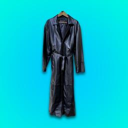 This vintage black leather trench coat for men is the perfect addition to any wardrobe. Made by Leather Link with high-quality leather, this coat is both stylish and durable. With a size of XL, it is perfect for any man looking for a comfortable and classic style. The trench coat style is timeless and versatile, making it perfect for any occasion. The black colour and leather material give it a sophisticated and elegant look, suitable for both casual and formal events. It is a must-have for any fashion-forward man looking to add a touch of class to his wardrobe. It's fully lined and has to internal pockets. Lovely cuff detail and there is a quarter length slit at the back with button (pictured).

Collar to bottom hem 58"
Shoulder to shoulder 21.5"
Shoulder to cuff 26.5"

Around 30 years old, this is in fantastic condition anyway, but certainly for its age. Lovely leather smell, not overpowering. Great clean condition - ready to be worn.