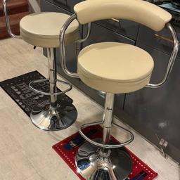 2 good cond comfy bar stools in cream colour