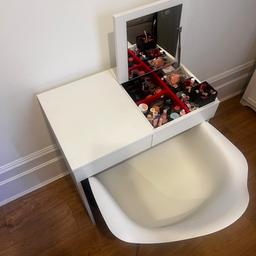 White make up table with white chair 
It has a mirror and drawer as shown in the pictures