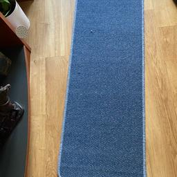 Brand new blue patterned narrow carpet mat with wool edging and  gel backing
4x1ft6 (122x46cm) 
Ideal for hard flooring