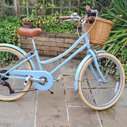 Girls' Bobbin bike, Gingersnap model in a soft duck egg blue with brown saddle and wicker basket (can easily be removed). Has 20" wheels and the seat is currently set at approx 30" from the floor and is adjustable, to give you an idea of the suitability age/size of your child. The bike is in very good condition as it has been rarely used. These sell for over £200 new. The matching helmet is included if desired. For collection (and trying out) in the Woodfield Plantation area of Balby, Doncaster.