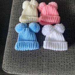 Hand Crocheted Double Pom Pom Hats 
Blue / White/Pink / Cream 
To fit Newborn to 3 months size 
(£5.00 each Hat ) 
Hand Crocheted New by myself 
Collection Only 🧶🧶🧶🧶🧶🧶🧶🧶.