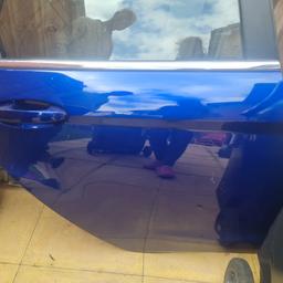 complete passenger rear door with door cards. deep impact blue. has some scratches but they can be mopped out.