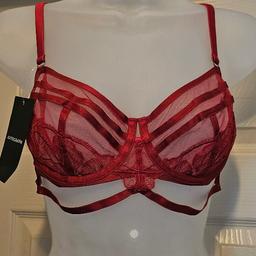 New tagged red .marks n spencers autograph bra.  underwired  seethrou cups adjustable straps. size 34b. collection ip3 or posting at your cost. no offers