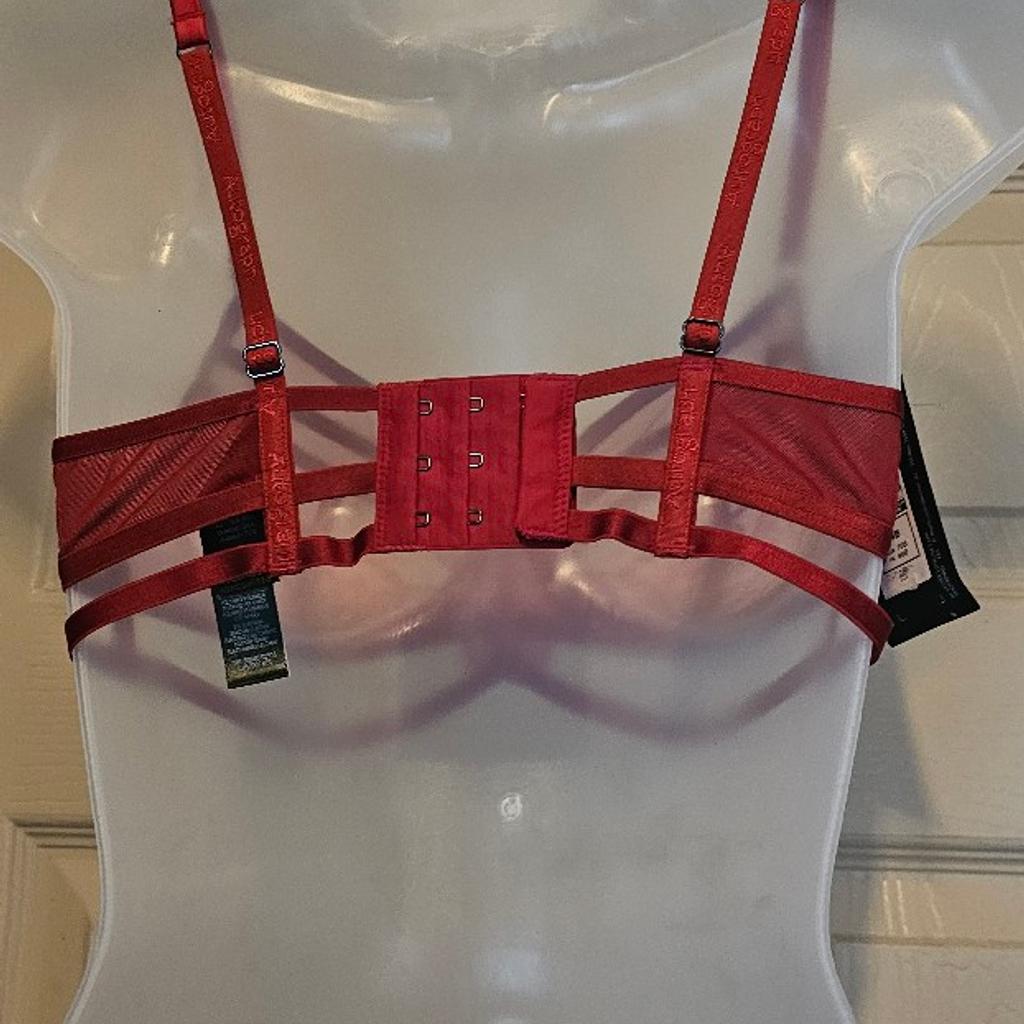 New tagged red .marks n spencers autograph bra. underwired seethrou cups adjustable straps. size 34b. collection ip3 or posting at your cost. no offers