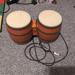 Donkey Konga drums for GameCube in good condition. Got a few marks on it no rips, has some paint near plug but been tested and works fine. Open to sensible offers