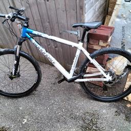 Cannondale mountain bike F6 large frame 24 speed, fluid disc brakes. Needs a new chain and pedals.
