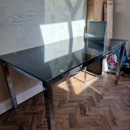 Black Glass Dining Table with 4 chairs. Recently moved house and no longer need it.
