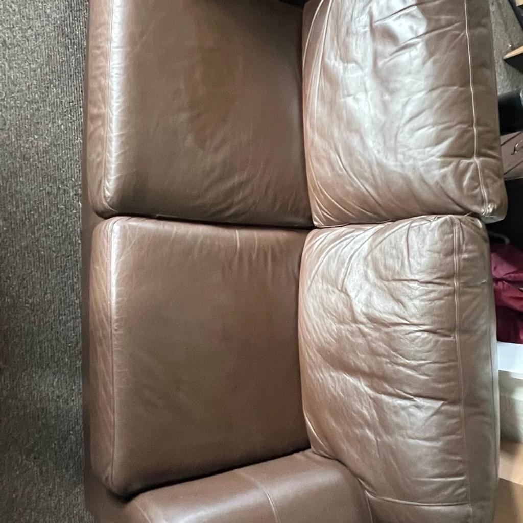 Very good condition
2 seater brown leather sofa and matching 1 seater arm chair

Sofa
174x98x78cm approx
Chair
108x84x78cm approx

Collection only