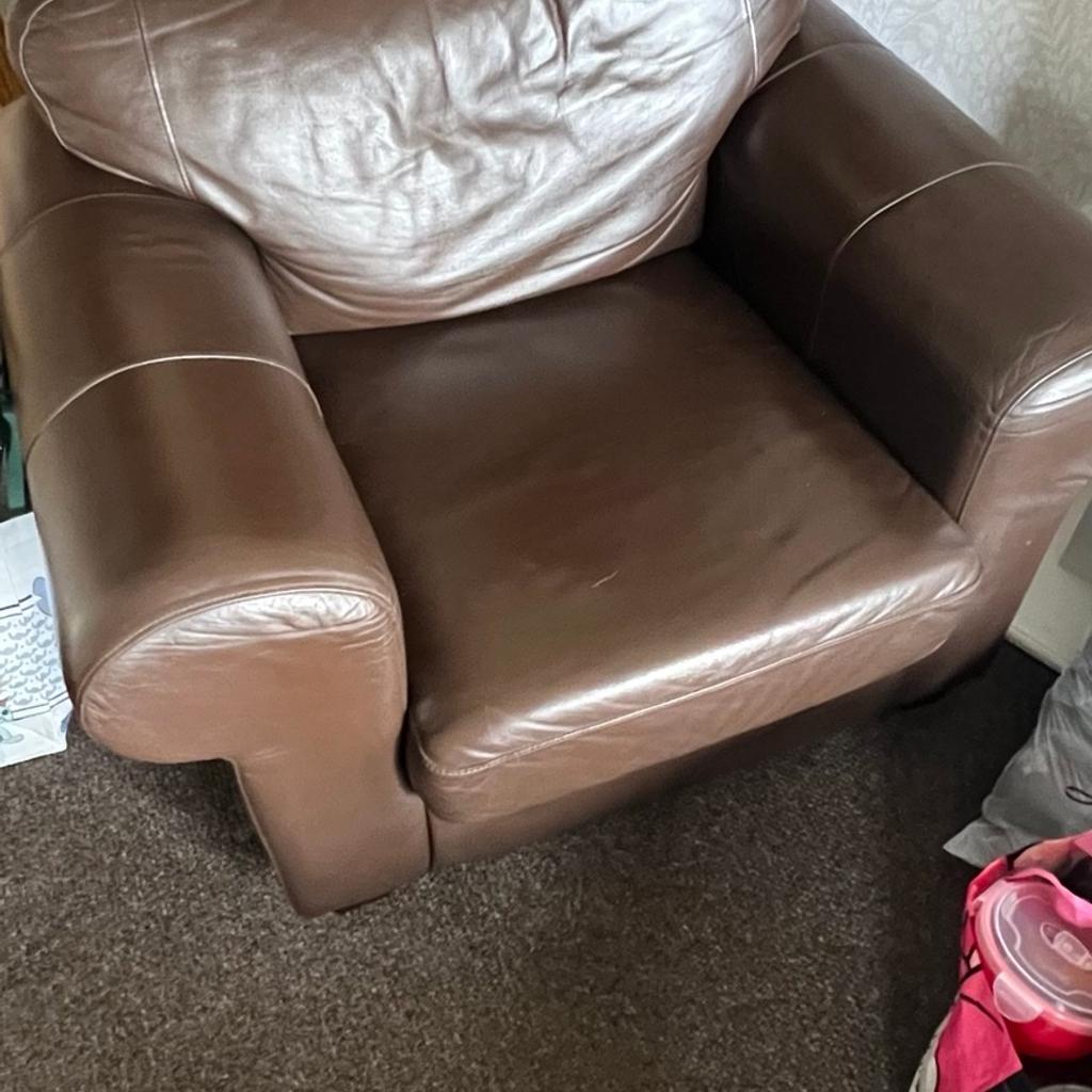 Very good condition
2 seater brown leather sofa and matching 1 seater arm chair

Sofa
174x98x78cm approx
Chair
108x84x78cm approx

Collection only