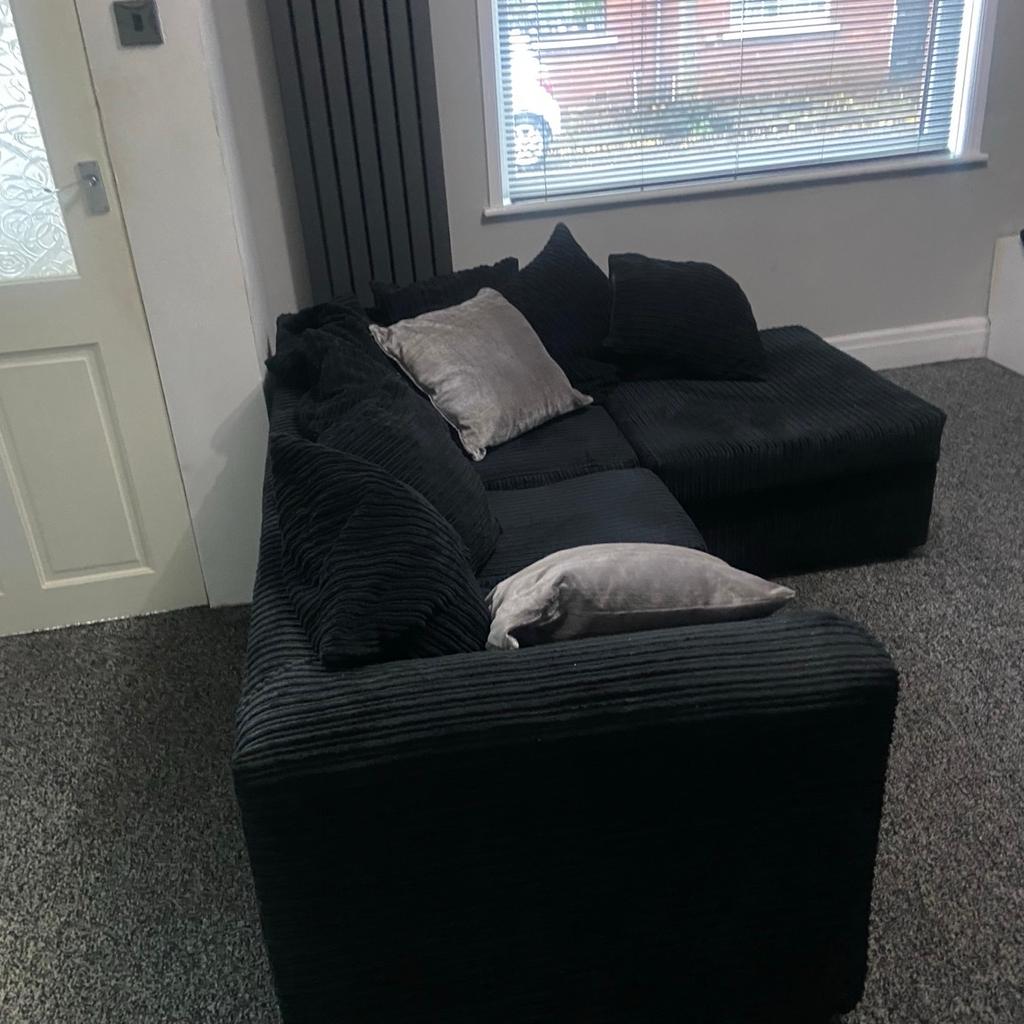 Corner sofa with cushions good condition no rip or damage ideal for small flat or living room