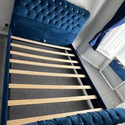 Blue plush diamanté kingsize bed frame
Small paint mark on one side 
Collection only
Will take down before collection needs gone soon as possible selling due to house move