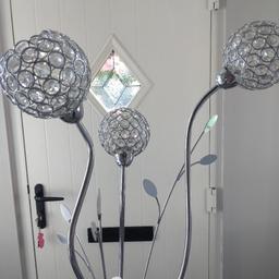 lovely floor lamp
3 lights, silver leaves.
approximately 5ft tall
Good clean condition
heavy weighted base.
Good quality
can deliver if local