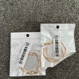 2 sets of golden colour hoop earrings 
New 
Pick up Wingate