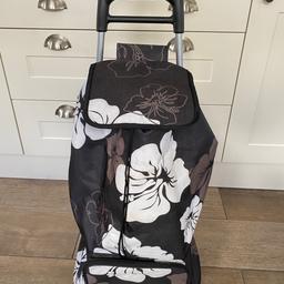 Black floral shopping trolley, the bag is removable for easy cleaning.

Collection B63